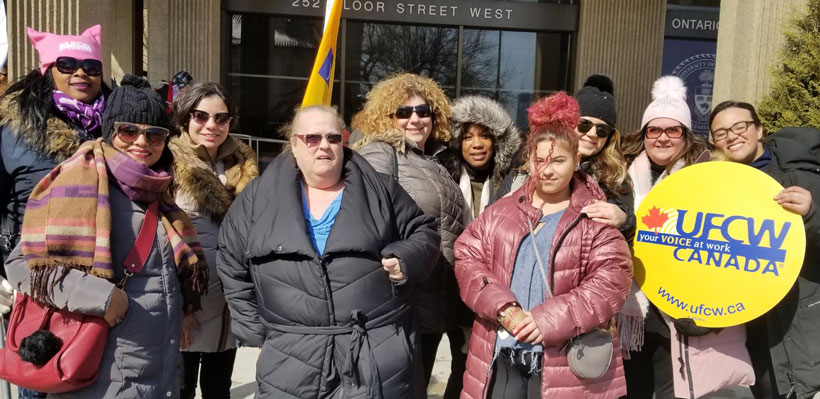 Local 1006A members march together for International Women's Day in Toronto.