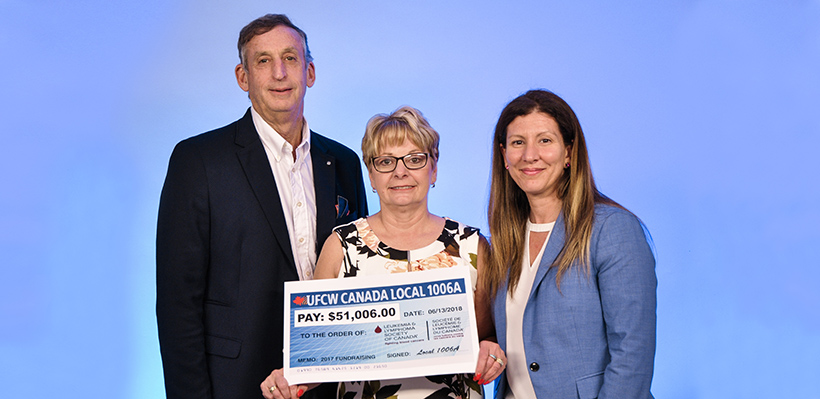 Local 1006A president Wayne Hanley and Leukemia Coordiator Diana O'Brien present cheque to the Leukemia and Lymphoma society of Canada.