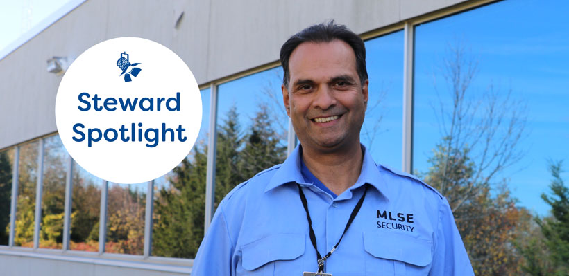 1006A member Mo poses for a picture at the union office in his security uniform. The emblem steward spotlight is overlayed on the photo.