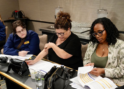 Emily Bower (left) Edward Brown (right) meets with UFCW representatives to discuss issues being brought forward to MPPs.